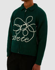 Tricot avec logo fleuri - Vert